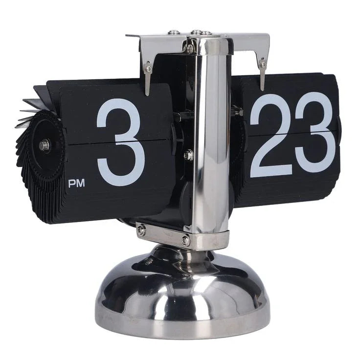 Retro black flip desk clock with white numbers and silver metal stand showing 3:23 PM