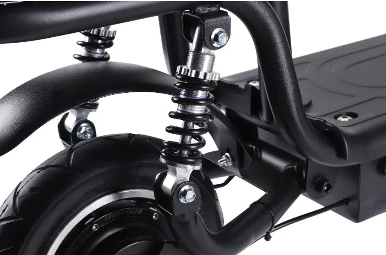 Close-up of black electric scooter rear wheel with suspension spring and sturdy frame