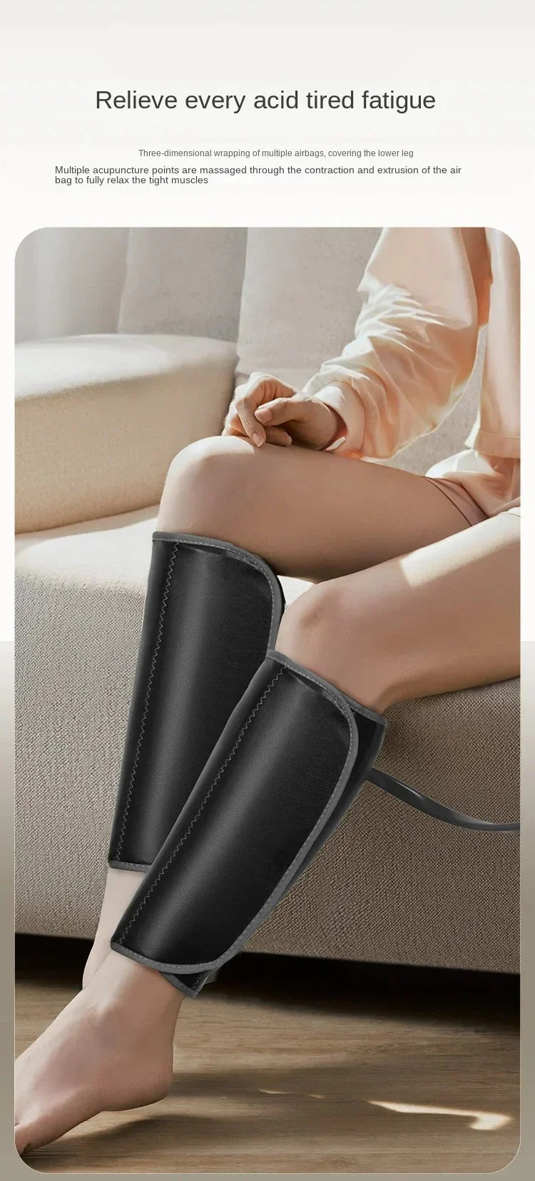 Person wearing black leg massager sleeves on lower legs while sitting on beige sofa to relieve fatigue