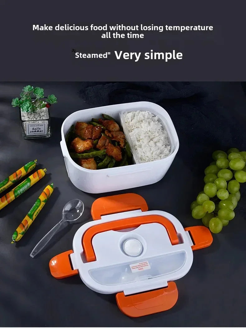White and orange lunch box with steamed rice and meat with green beans, plastic spoon, green grapes, and decorative plant
