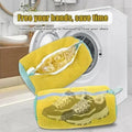 Yellow shoe washing bag with zipper for front loading washing machine in modern bathroom