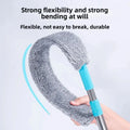Flexible gray microfiber mop head bending easily on blue handle, demonstrating durability and strong flexibility