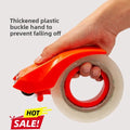 Hand holding orange plastic tape dispenser with clear packing tape, thickened buckle to prevent falling off