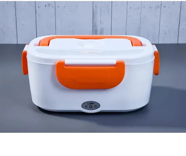 White and orange electric lunch box with handle and lock clips on gray surface