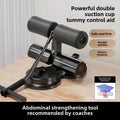 Black tummy control abdominal strengthening tool with double suction cups on wooden floor