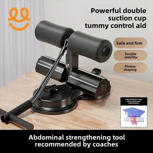 Black tummy control abdominal strengthening tool with double suction cups on wooden floor