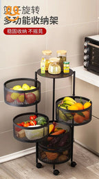Black metal multi-tier rotating kitchen storage rack with fresh fruits, vegetables, and jars