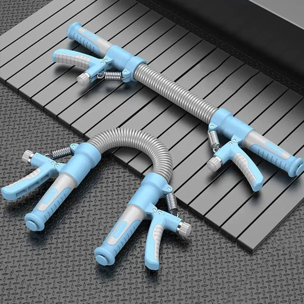 Two blue hand grip strengtheners with silver spring coils on a gray metal floor and platform