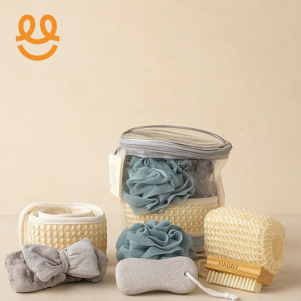 Clear bag with blue bath poufs, exfoliating back scrubbers, headband, and body brush set
