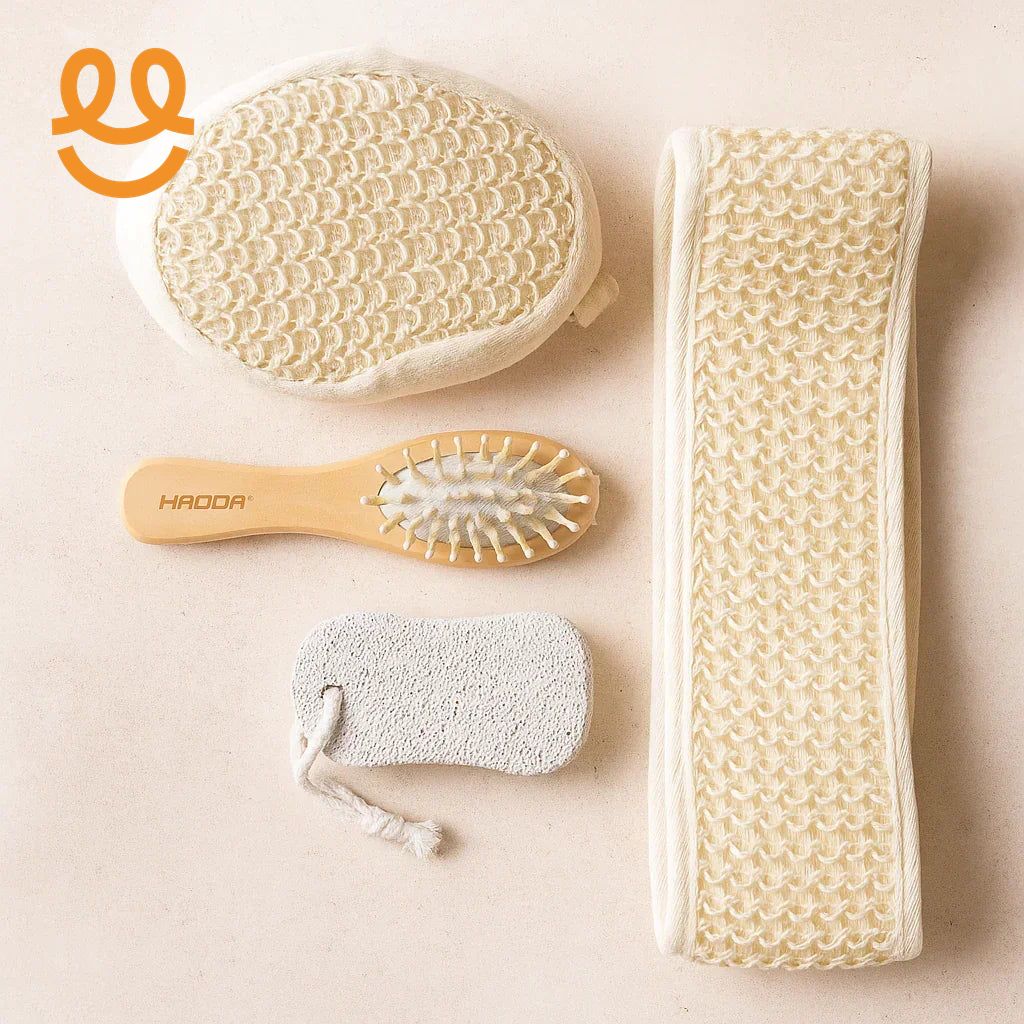 Set of natural beige bath accessories including exfoliating glove, back scrubber, wooden hairbrush, and pumice stone