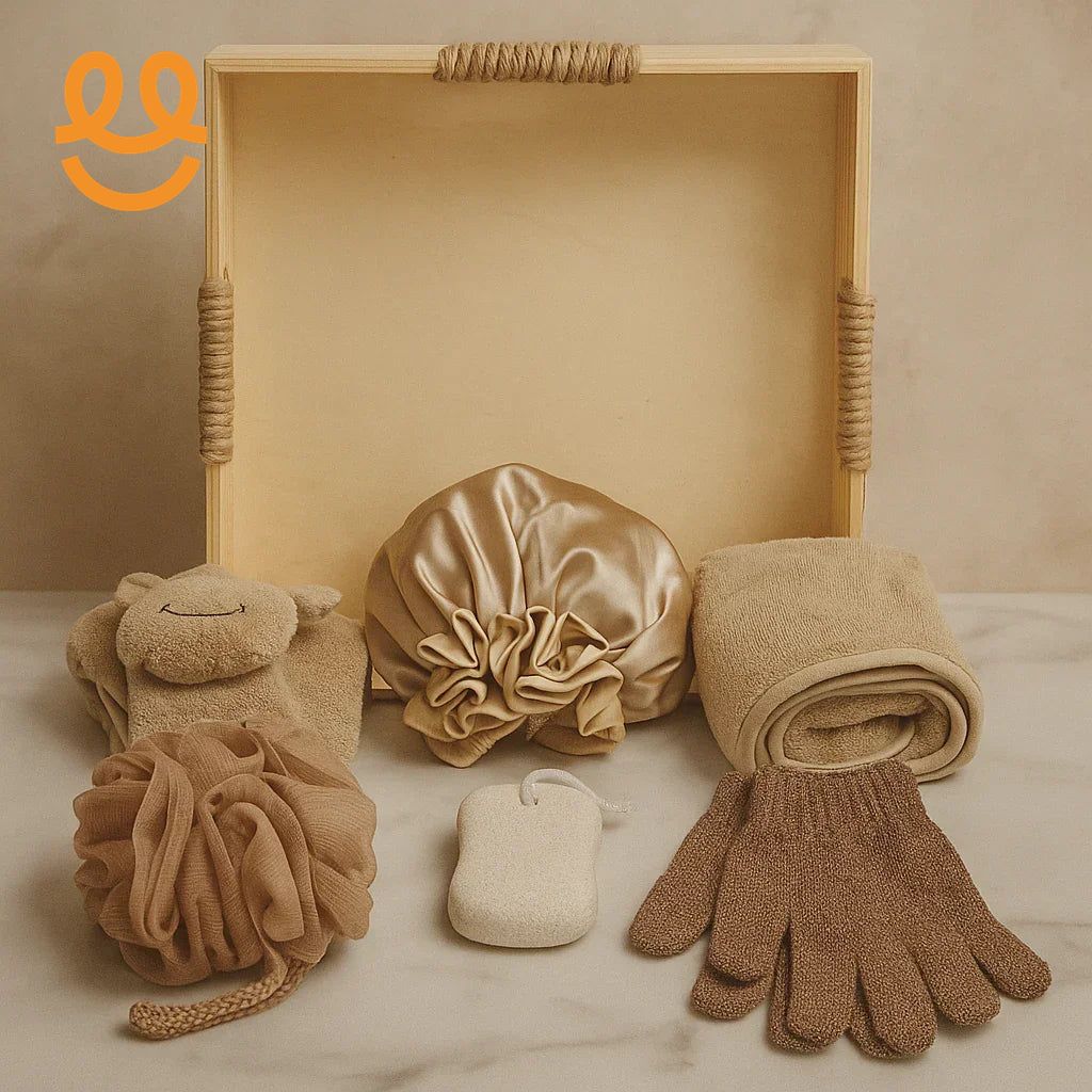 Aesthetic bath accessories set with beige towel, shea shower cap, exfoliating gloves, loofah, sponge, displayed in wooden tray