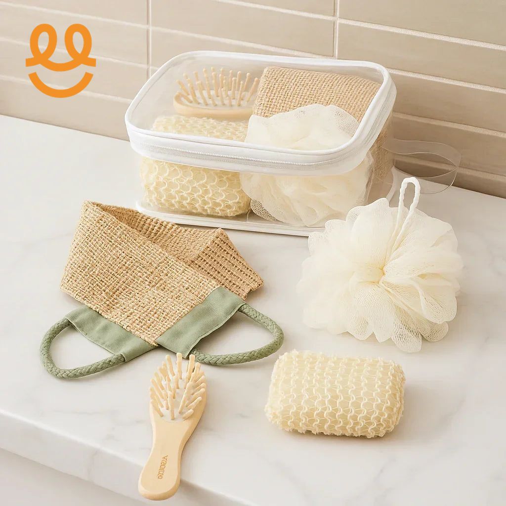 Bathroom spa essentials including natural loofah, exfoliating gloves, massaging brush, and mesh sponge on marble countertop