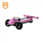 Folded pink and black three-wheeled scooter with a silver handlebar against white background