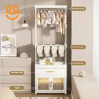 White multifunctional clothes rack with hanging area, trouser rack, drawer, and storage cabinet in beige bedroom