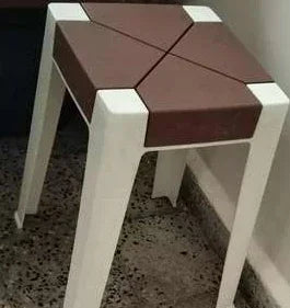 Modern square wooden side table with dark brown top and white legs on patterned floor