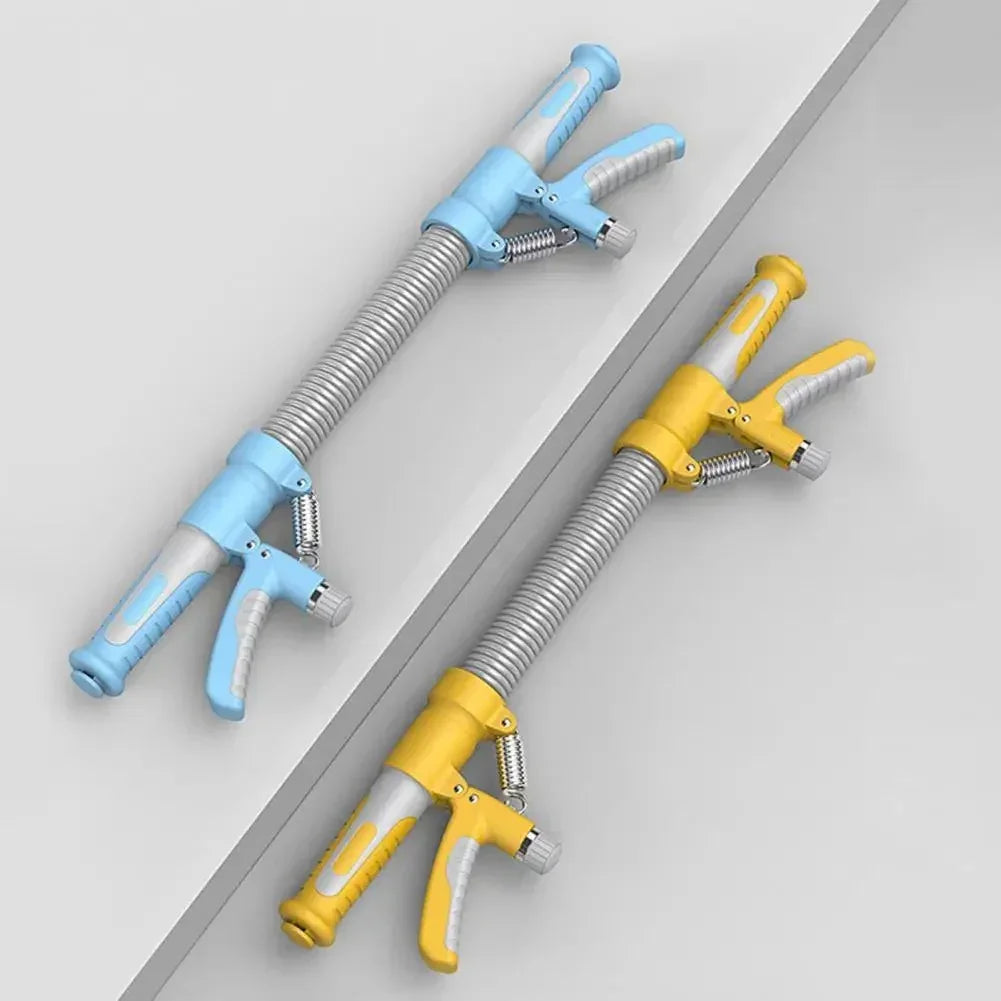 Two handheld grip strengtheners with metal springs, one blue and one yellow, on a gray surface