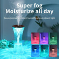 Transparent blue LED humidifier emitting mist with nano atomization and ambient light effects