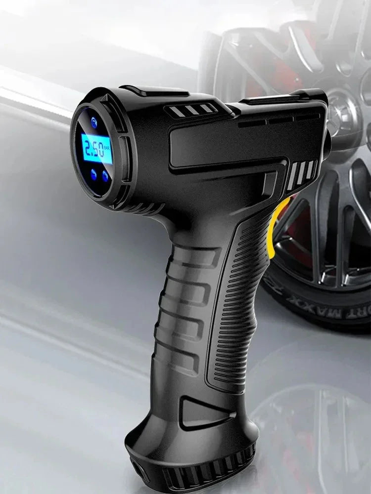 Black digital tire pressure gauge with blue LED display showing 2.50 bar near car wheel