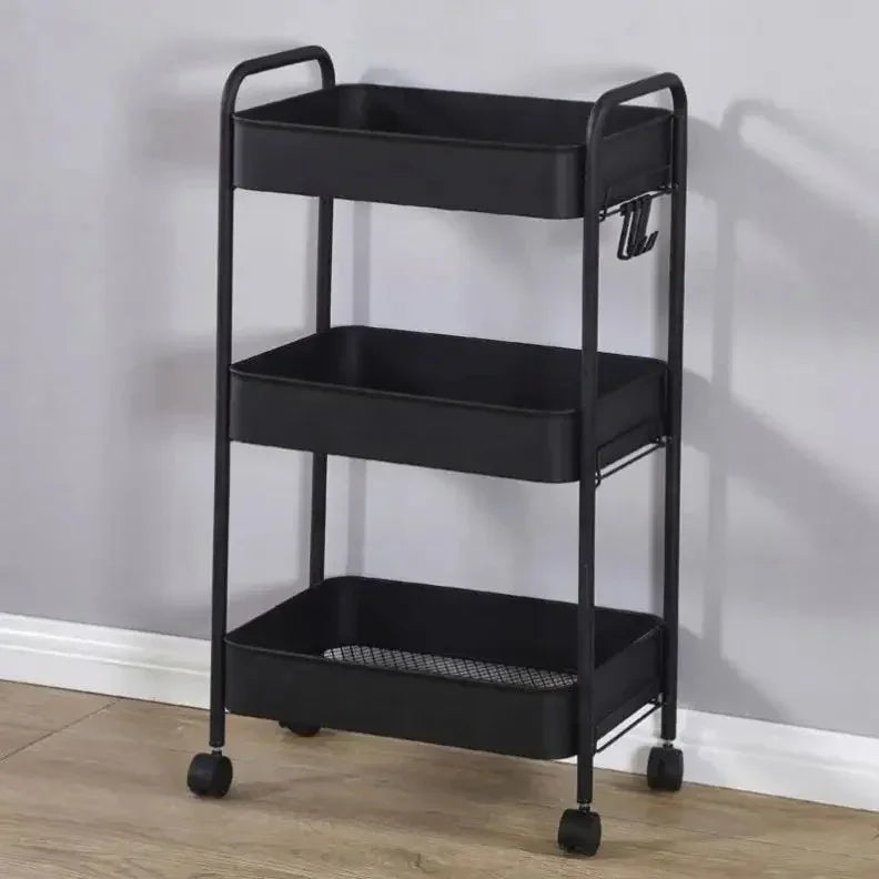 Black metal 3-tier rolling storage cart with handles and wheels on wooden floor