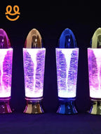 Four colorful LED tornado lamps with swirling light effects against a dark background