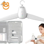White electronic clothes hanger with drying and sterilizing functions beside packed suitcase and woman holding hanger