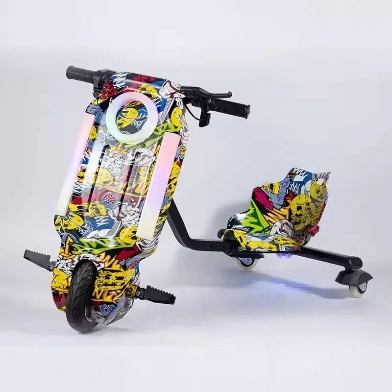 Electric drift trike with colorful graffiti design and LED lights on white background