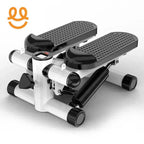 Compact black and white mini stepper exercise machine with digital monitor and resistance tubes