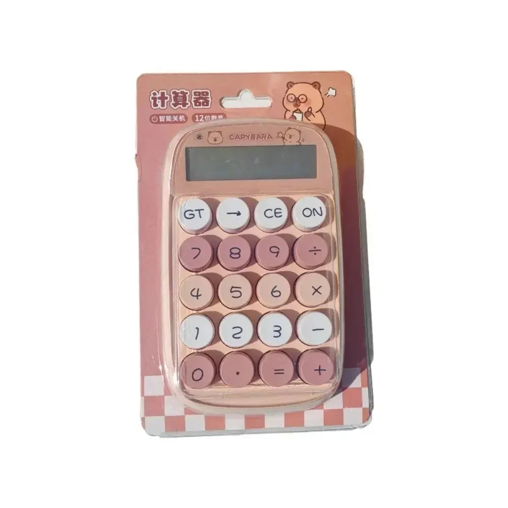 Pink capybara-themed calculator with round buttons in pastel colors on pink packaging