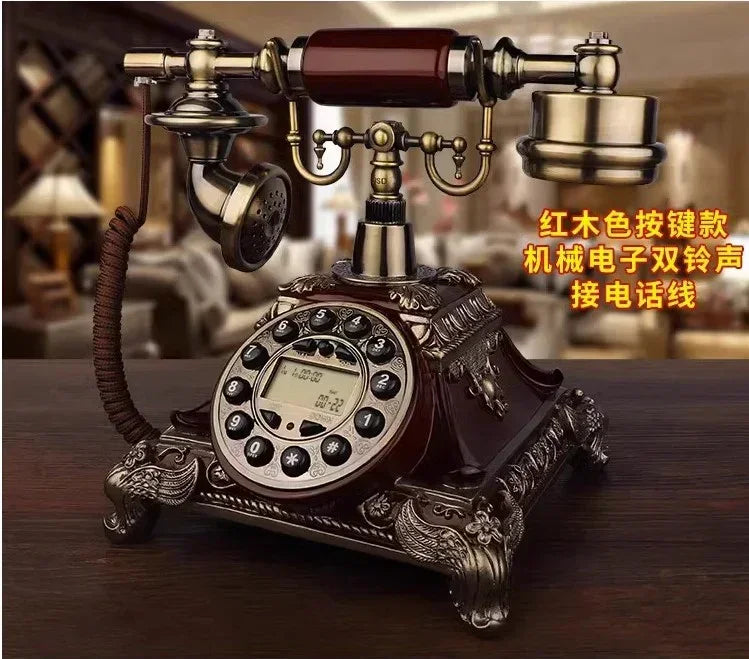 Vintage rotary dial telephone with dark wood and ornate brass detailing on wooden table in cozy room