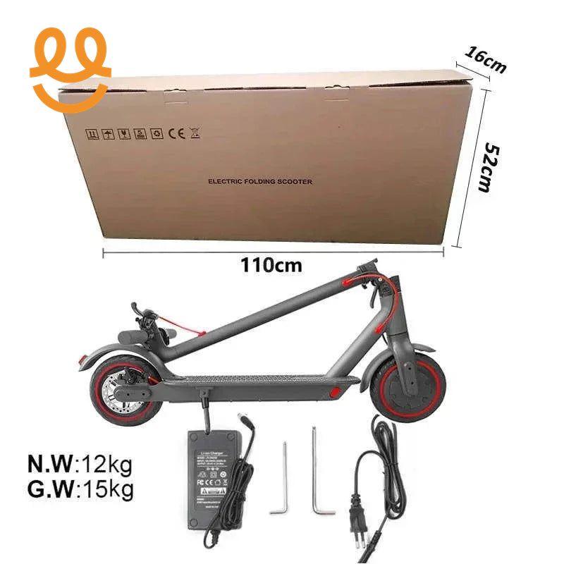Folded gray electric scooter with red accents, charger, tools, and packaging box showing dimensions