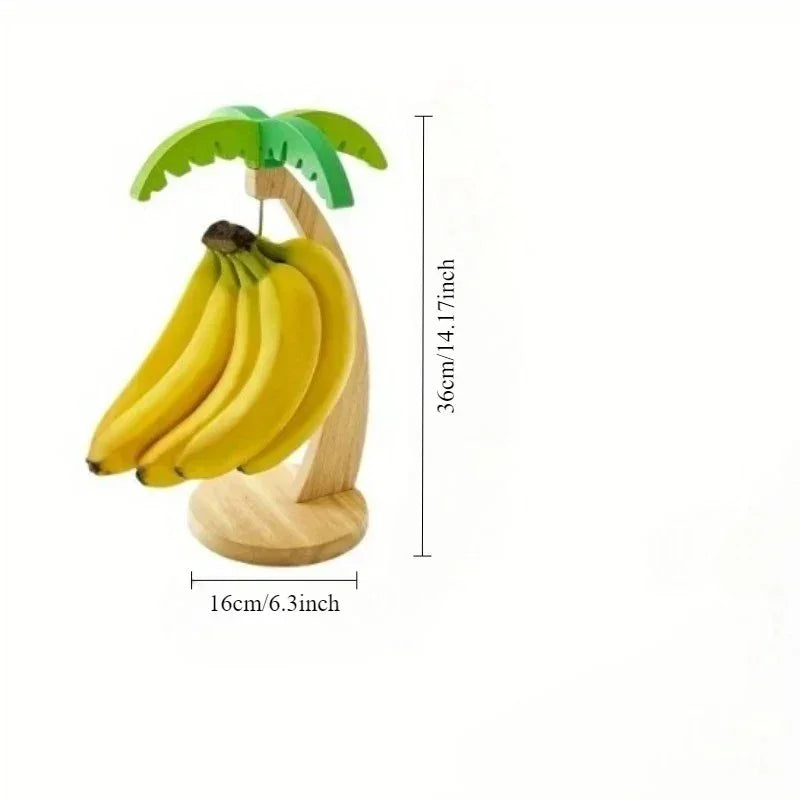Wooden banana hanger with green leaf design holding a bunch of yellow bananas, dimensions 36cm high, 16cm base