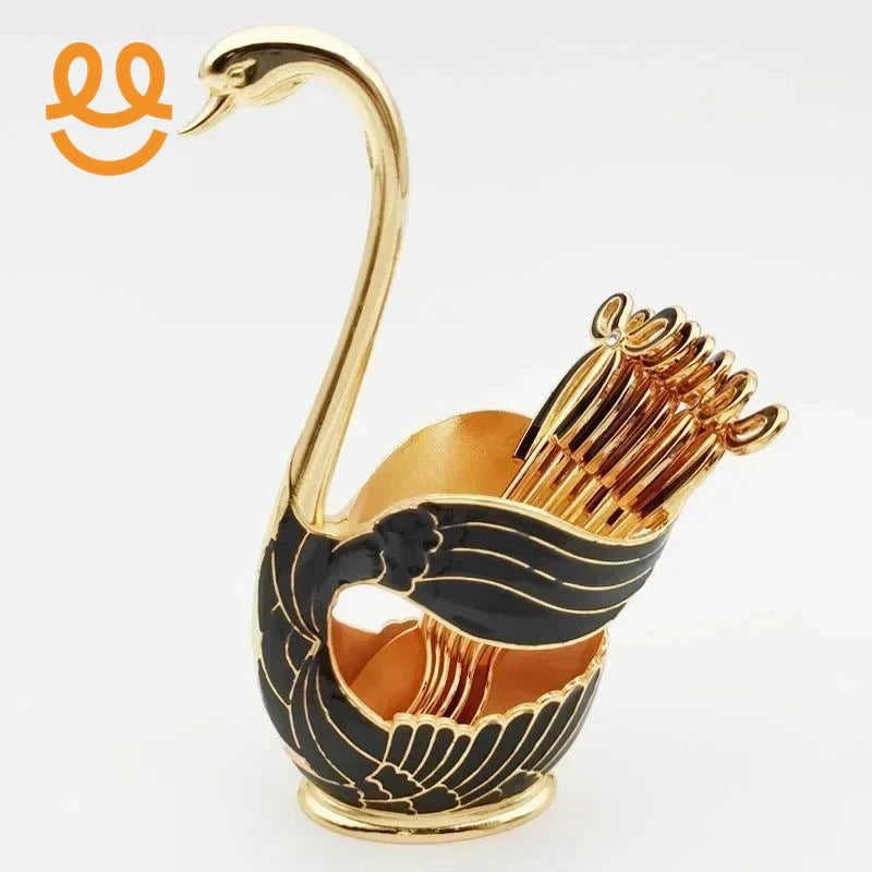 Elegant gold and black swan-shaped toothpick holder with decorative toothpicks