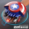 Captain America themed shield launcher toy with red, white, and blue design, held in hand shooting projectiles