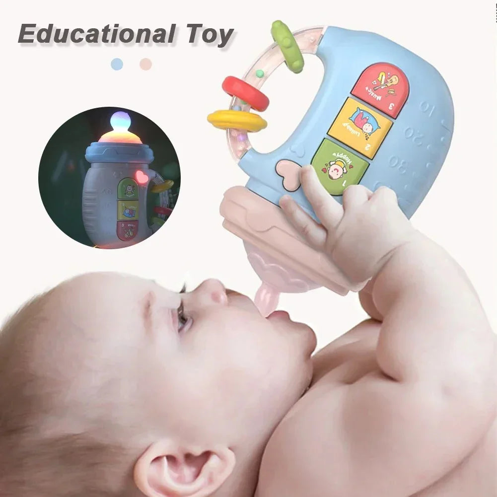 Baby playing with a colorful educational toy bottle with buttons and rings