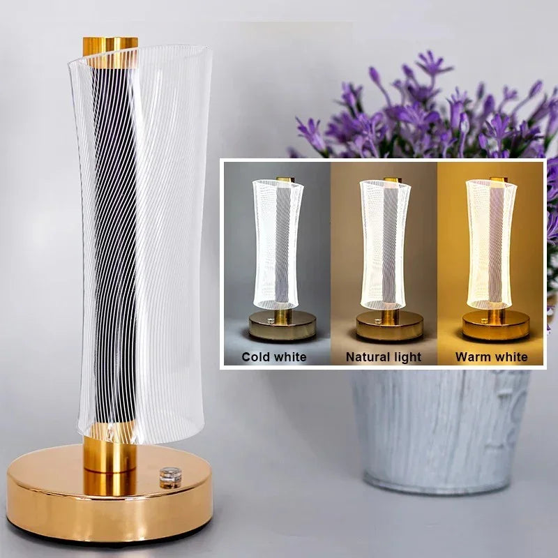 Modern LED table lamp with gold base and clear spiral acrylic shade showing cold white, natural light, and warm white colors