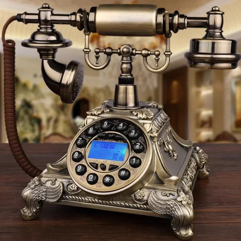 ornate vintage rotary phone with digital display on wooden table in classic interior