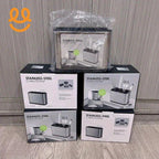 Stack of stainless steel cutlery bucket boxes with images of utensils on a wooden floor