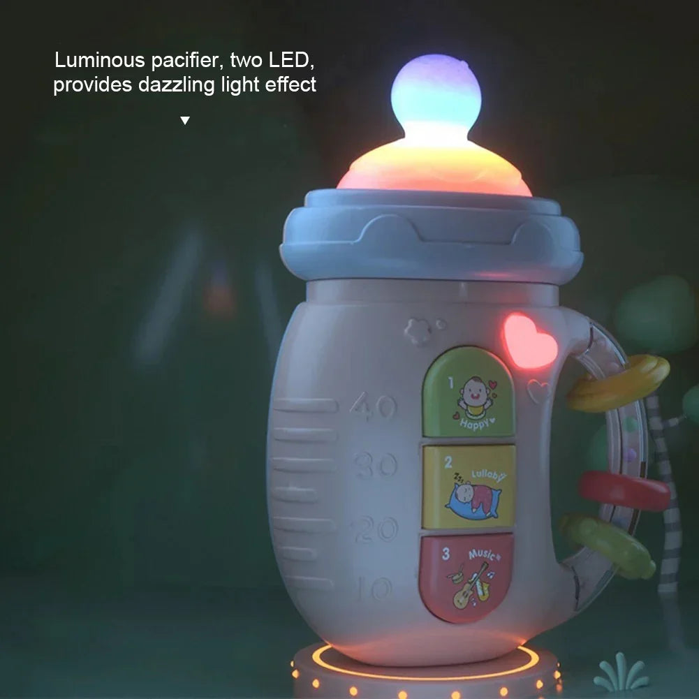 Luminous baby pacifier bottle toy with LED light effects and colorful buttons in dark setting