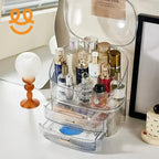 Transparent acrylic makeup organizer with skincare bottles and perfumes on white vanity table