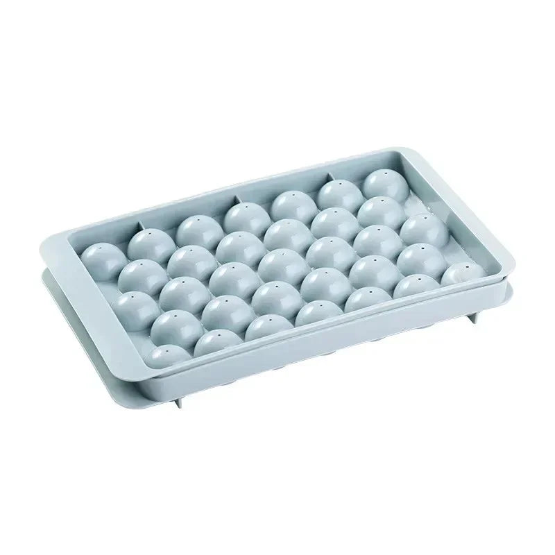 Gray silicone ice cube tray with 30 spherical molds for round ice balls