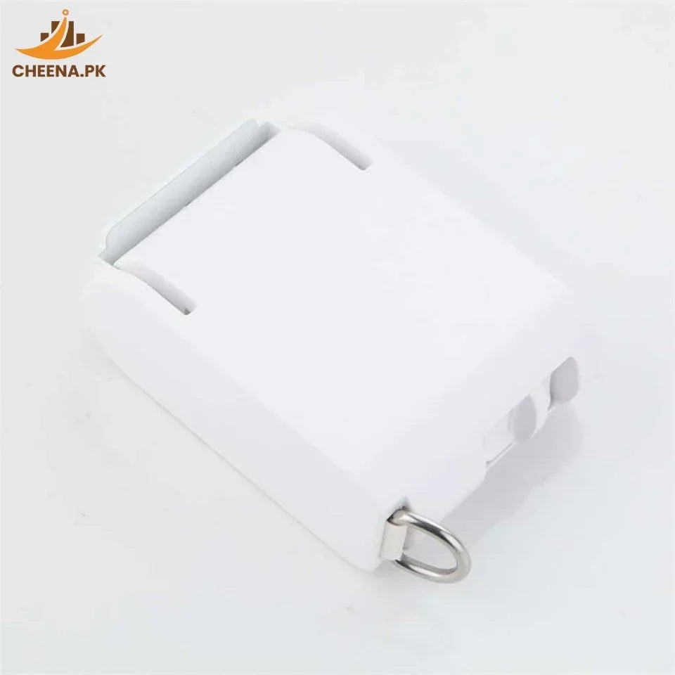 White small plastic clothesline pulley with metal hook on white background