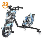 Electric drift trike with black, blue, and white graffiti pattern, single front wheel and rear seat