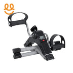 Compact black and silver mini exercise bike with digital display and pedal straps