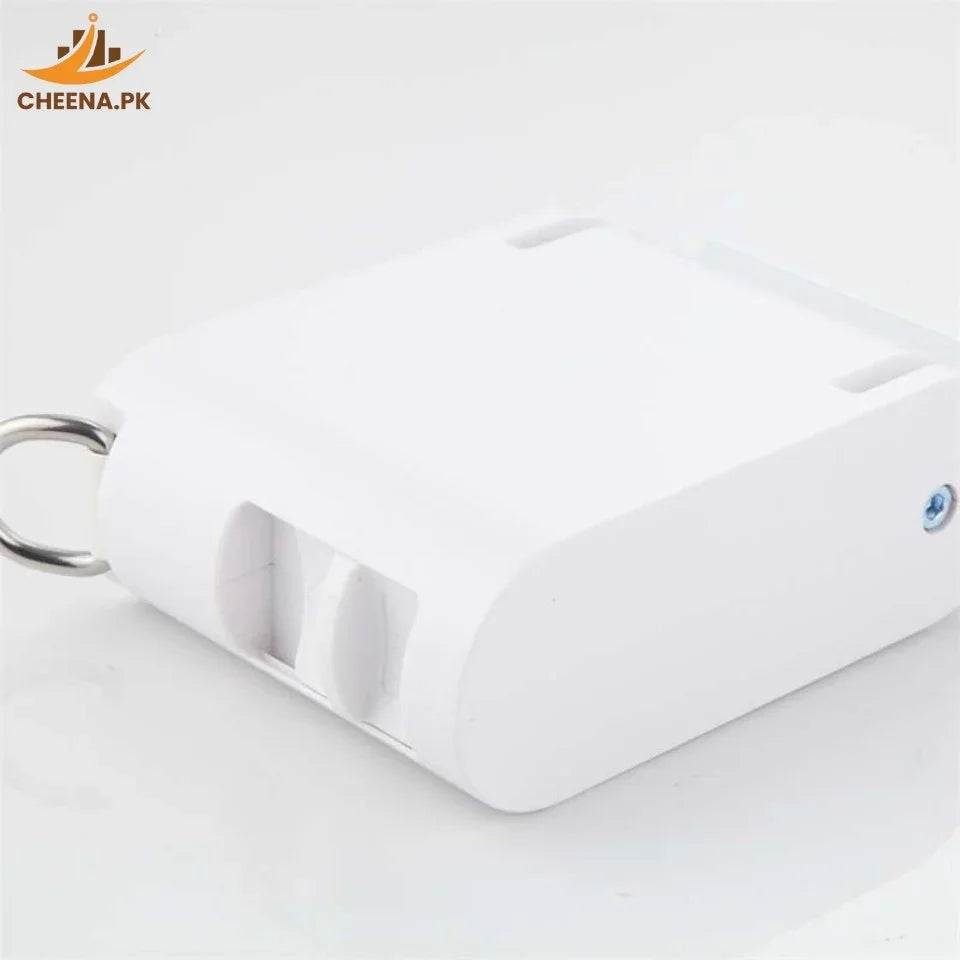 White plastic mechanical combination padlock with metal shackle on white surface