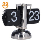 Retro black flip desk clock with white numbers and silver metal stand showing 3:23 PM