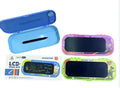 Three colorful LCD writing tablet pencil boxes in blue, pink, and green with math and drawing designs