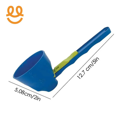 Blue plastic measuring scoop with a green clip, 12.7 cm long and 5.08 cm wide