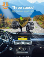 Black dual head car dashboard fan with three speed control and 360-degree rotation on a mountain road drive