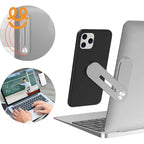Magnetic laptop phone holder attached to silver laptop holding black smartphone horizontally
