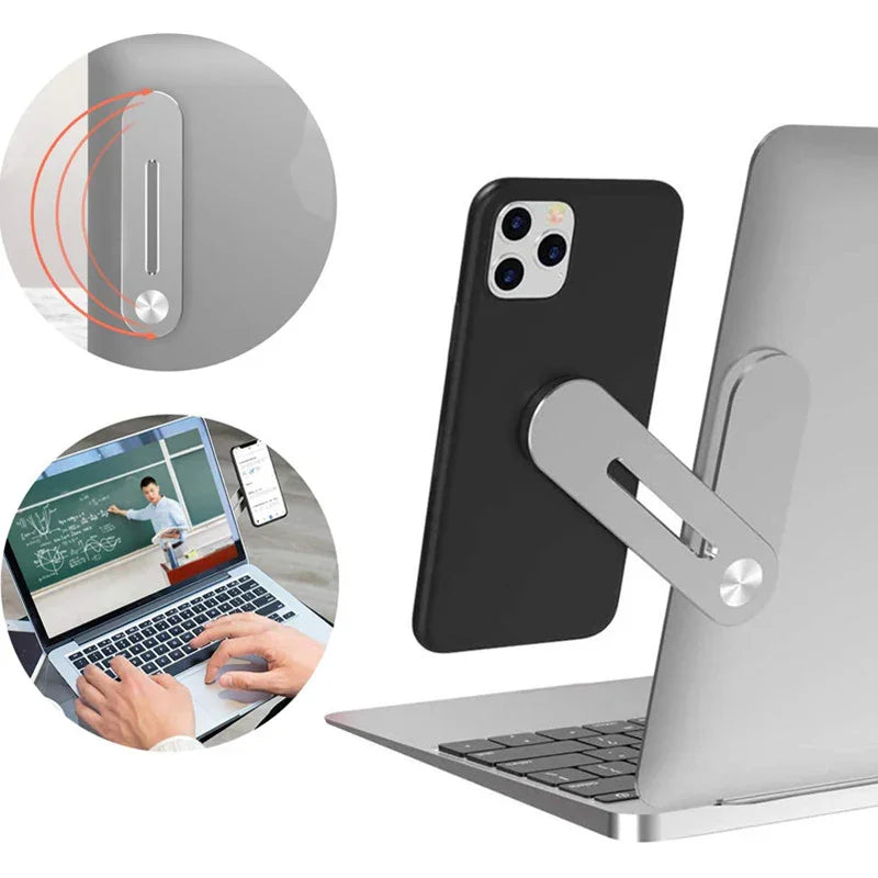 Magnetic laptop phone holder attached to silver laptop holding black smartphone horizontally